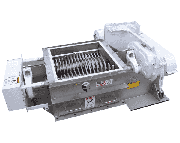 Industrial crusher with heavy-duty rotating shafts and intermeshing blades designed for size reduction of bulk materials.